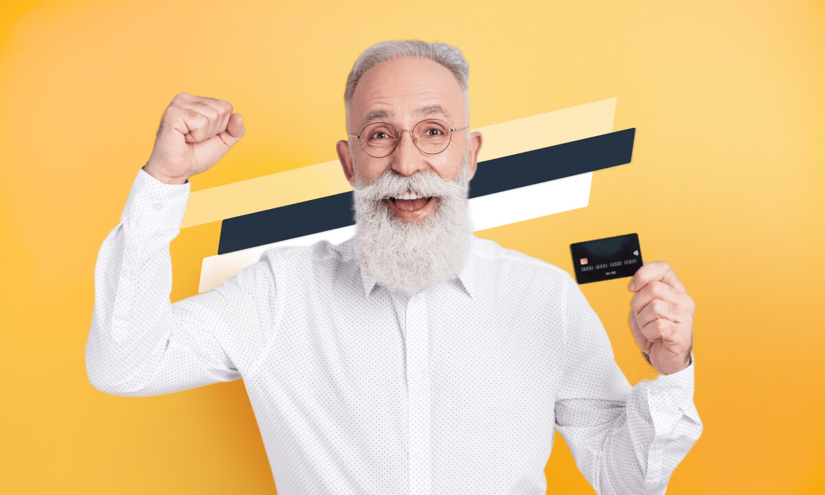 Happy man with credit card